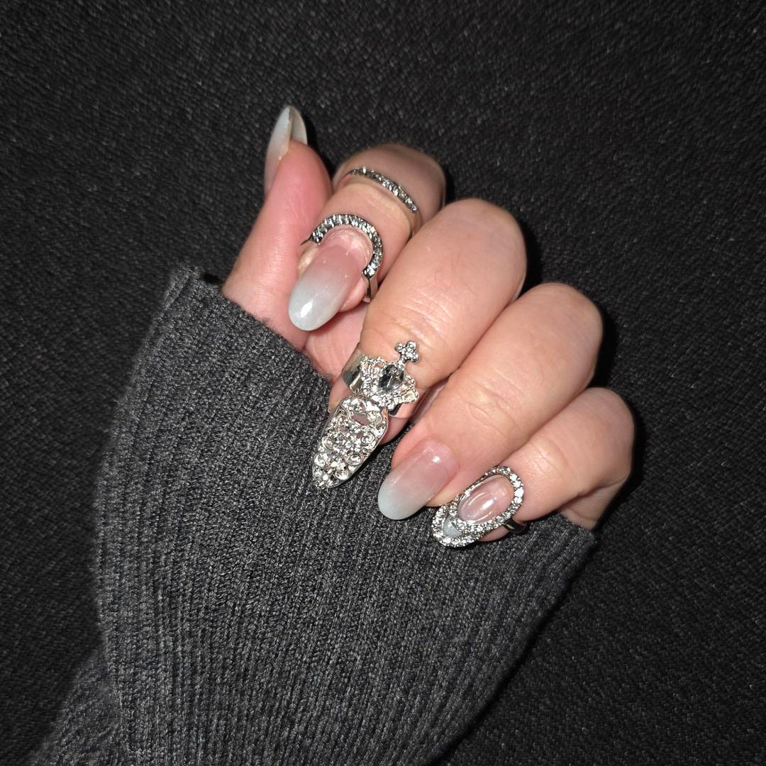 Nails & Nail Ring Bundle: Laser Silver nail rings on hand — lifestyle | GlossyMuse