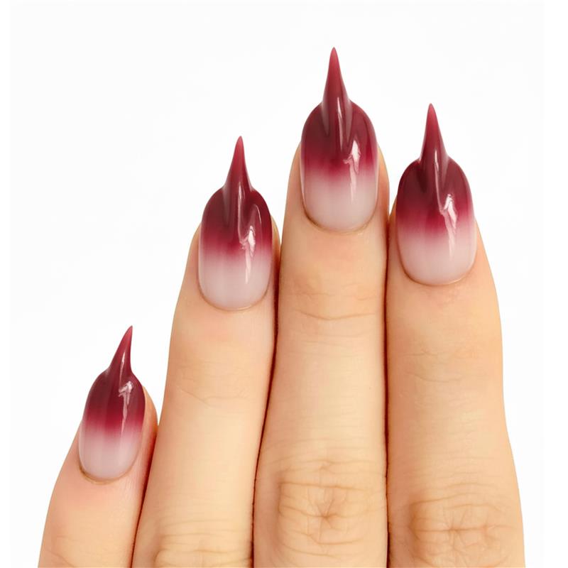 Model wearing Bloody French Cat Claw cat-claw press-on nails — lifestyle close-up | GlossyMuse