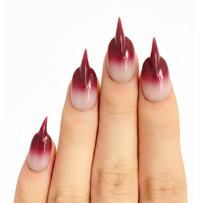 Model wearing Bloody French Cat Claw cat-claw press-on nails — lifestyle close-up | GlossyMuse