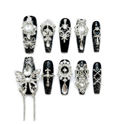 Black Charm Muse almond medium handcrafted press-on nails — front view | GlossyMuse