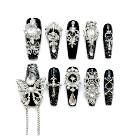 Black Charm Muse almond medium handcrafted press-on nails — front view | GlossyMuse