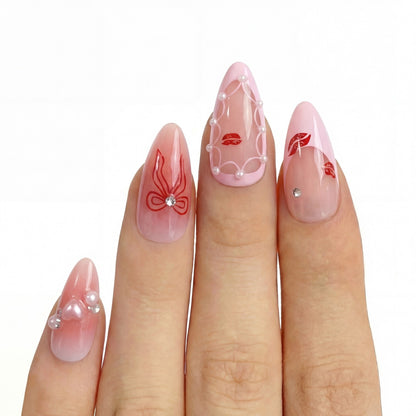 Cherry Kiss Martini press-on nail kit contents — adhesive tabs, file and cuticle pusher | GlossyMuse