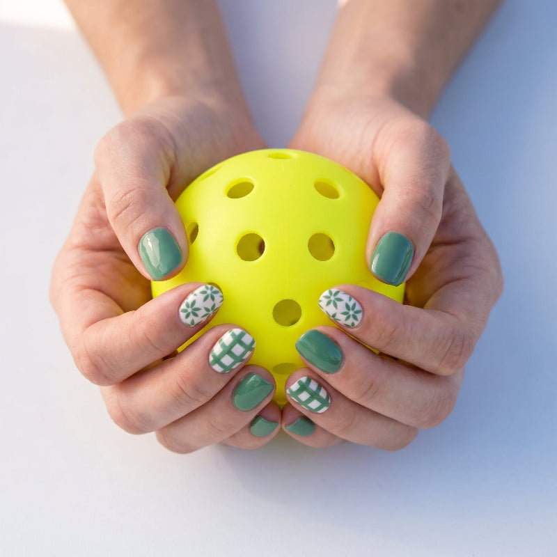 Field day pickleball nail close-up — sage green and white court grid detail | GlossyMuse