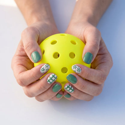 Field day pickleball nail close-up — sage green and white court grid detail | GlossyMuse
