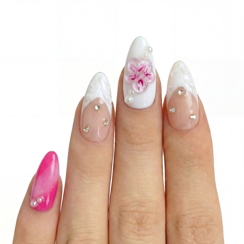 Floral Pink Daiquiri press-on nail kit contents — adhesive tabs, file and cuticle pusher | GlossyMuse