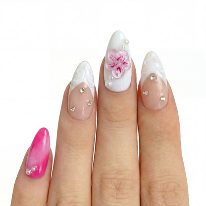 Floral Pink Daiquiri press-on nail kit contents — adhesive tabs, file and cuticle pusher | GlossyMuse
