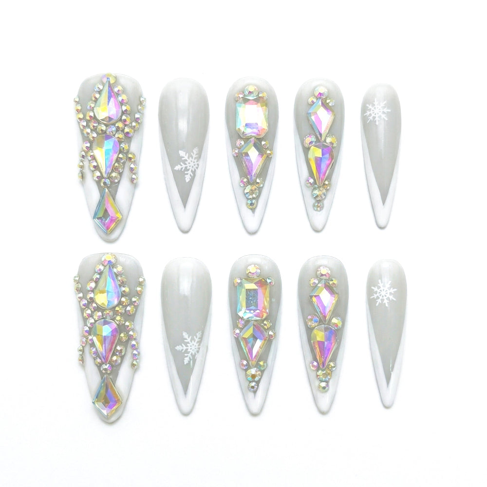 Frosted Glass Spikes almond medium handcrafted press-on nails — front view | GlossyMuse