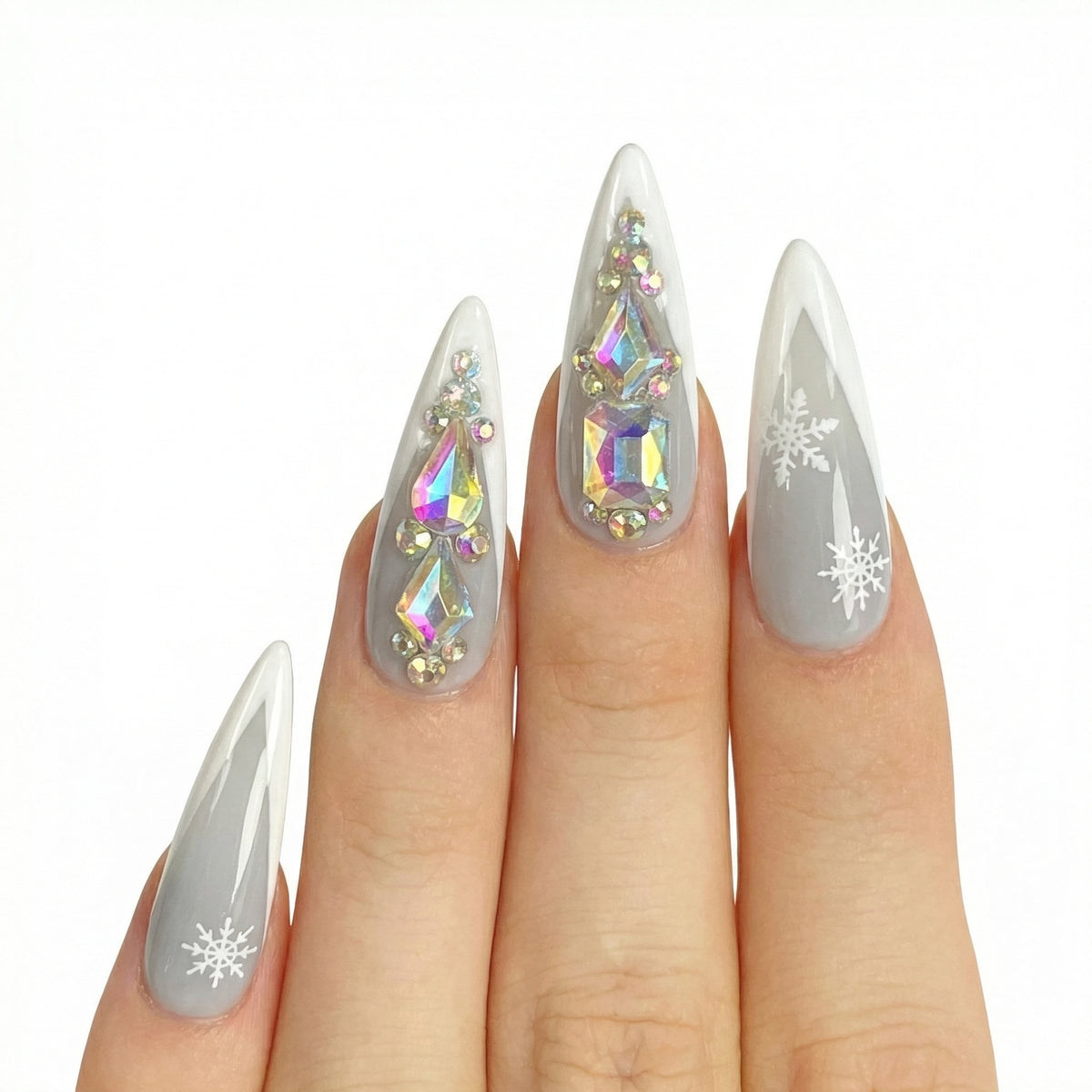 Model wearing Frosted Glass Spikes almond press-on nails — lifestyle close-up | GlossyMuse