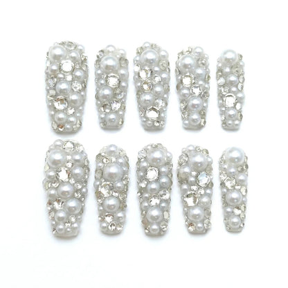 Glossy Party Pearls almond medium handcrafted press-on nails — front view | GlossyMuse
