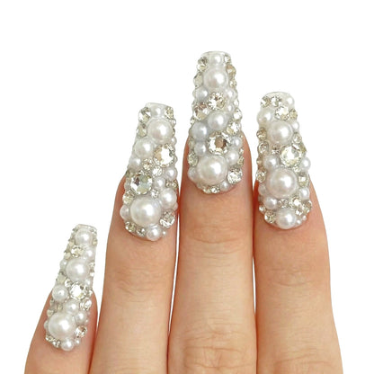 Glossy Party Pearls press-on nails 3D detail shot — almond shape | GlossyMuse