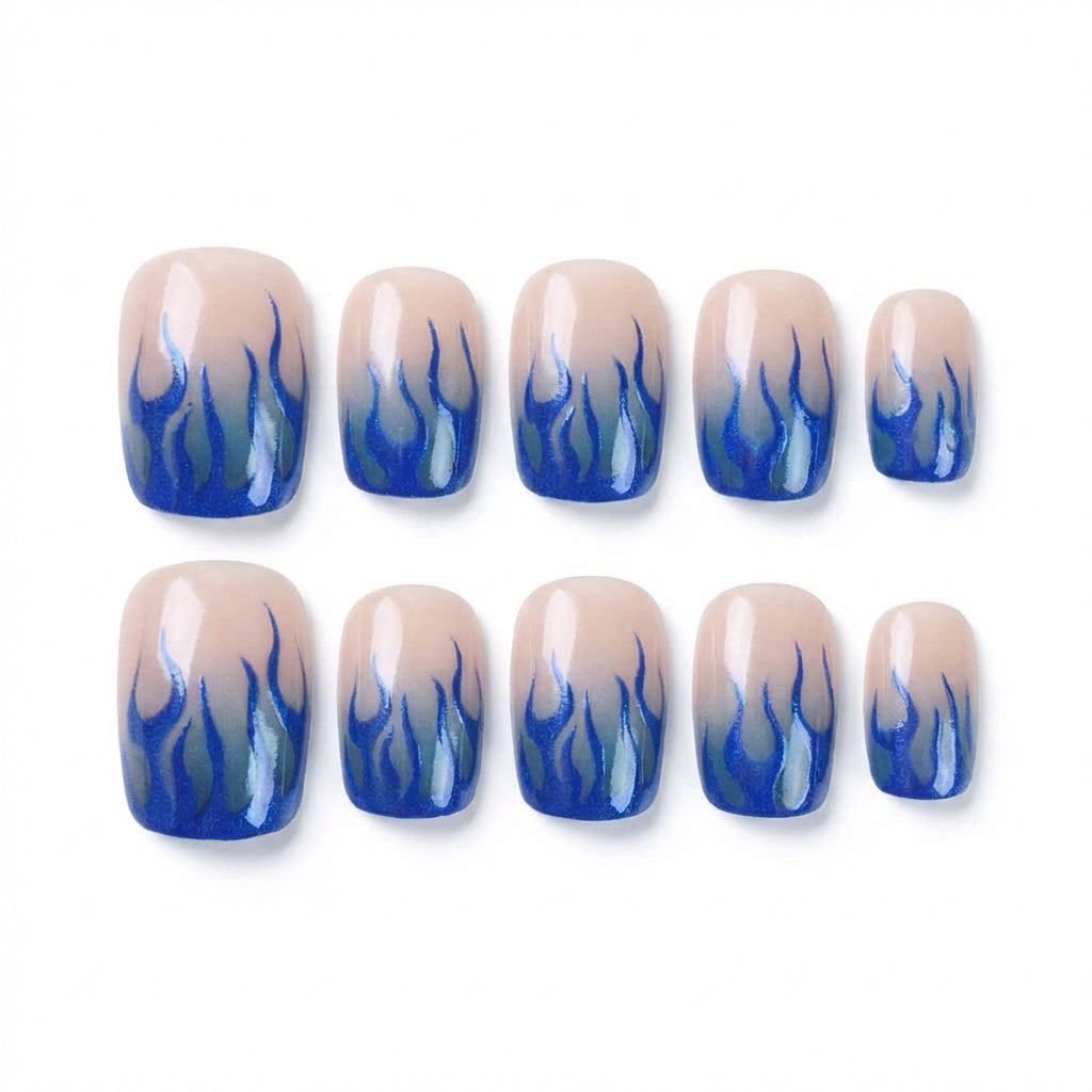A set of short square nails featuring gradient designs with blue flames over a nude base.