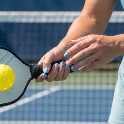 Skyline Serve nails on hand — blue floral 3D handcrafted pickleball press-ons | GlossyMuse