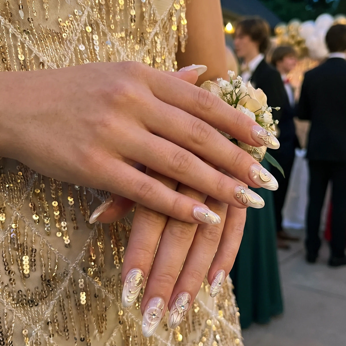 Celestial Luxe  Ivory Gold Orbit press-on nail kit contents — adhesive tabs, file and cuticle pusher | GlossyMuse