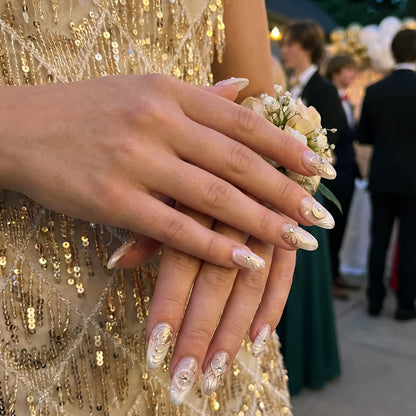 Celestial Luxe  Ivory Gold Orbit press-on nail kit contents — adhesive tabs, file and cuticle pusher | GlossyMuse