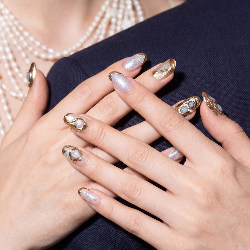 Ethereal Glow  Pearlflare Luxe press-on nail kit contents — adhesive tabs, file and cuticle pusher | GlossyMuse