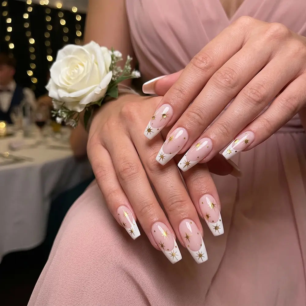 Radiant Flare  Sunlit Star press-on nail kit contents — adhesive tabs, file and cuticle pusher | GlossyMuse