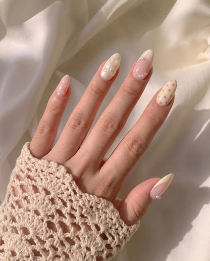 Vanilla Polka | Bow Accent Medium Almond Press On Nails