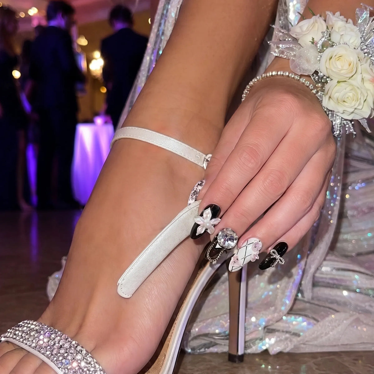 Model wearing Eclectic Artist  Vintage Masque almond press-on nails — lifestyle close-up | GlossyMuse
